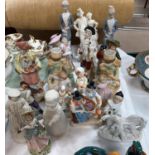 A collection of Victorian and other china figures and groups
