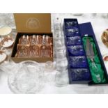 A boxed set of Royal Doulton crystal tumblers; a similar boxed set; a "Galway Crystal" boxed pie