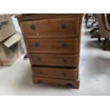 A pair of reproduction walnut bachelors chests