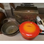 An embossed brass log box; 2 brass jam pans; a large le Creuset casserole dish; etc.