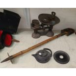 An Edwardian bamboo shooting stick; a set of 19th century kitchen scales weights; a Chinese cast
