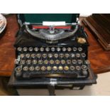 A vintage Imperial typewriter, cased