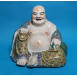 A large Chinese Buddha figure decorated in polychrome in the Cantonese manner, impressed seal mark