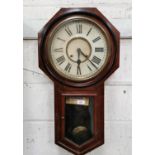 An Ansonia "Regulator A" wall clock with drop dial in octagonal mahogany case