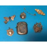 A silver vesta case, Birmingham; a silver cricket trophy fob; 2 others; a 9 carat gold brooch;