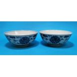 2 Chinese porcelain circular bowls decorated with sylized flowers in underglaze blue, 6 character