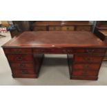 A mahogany reproduction partners desk with 6 pedestal drawers, width 72"