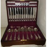A Walter Trickett of Sheffield mahogany cased canteen of silver plated cutlery