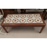 A 1960's teak coffee table with rectangular tile top