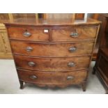 An early 19th century mahogany bow front chest of 3 long and 2 short drawers