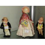 Royal Doulton figure 'Granny's Shawl' HN 1647 (petal chipped);2 Dickens figures Captain Cuttle &