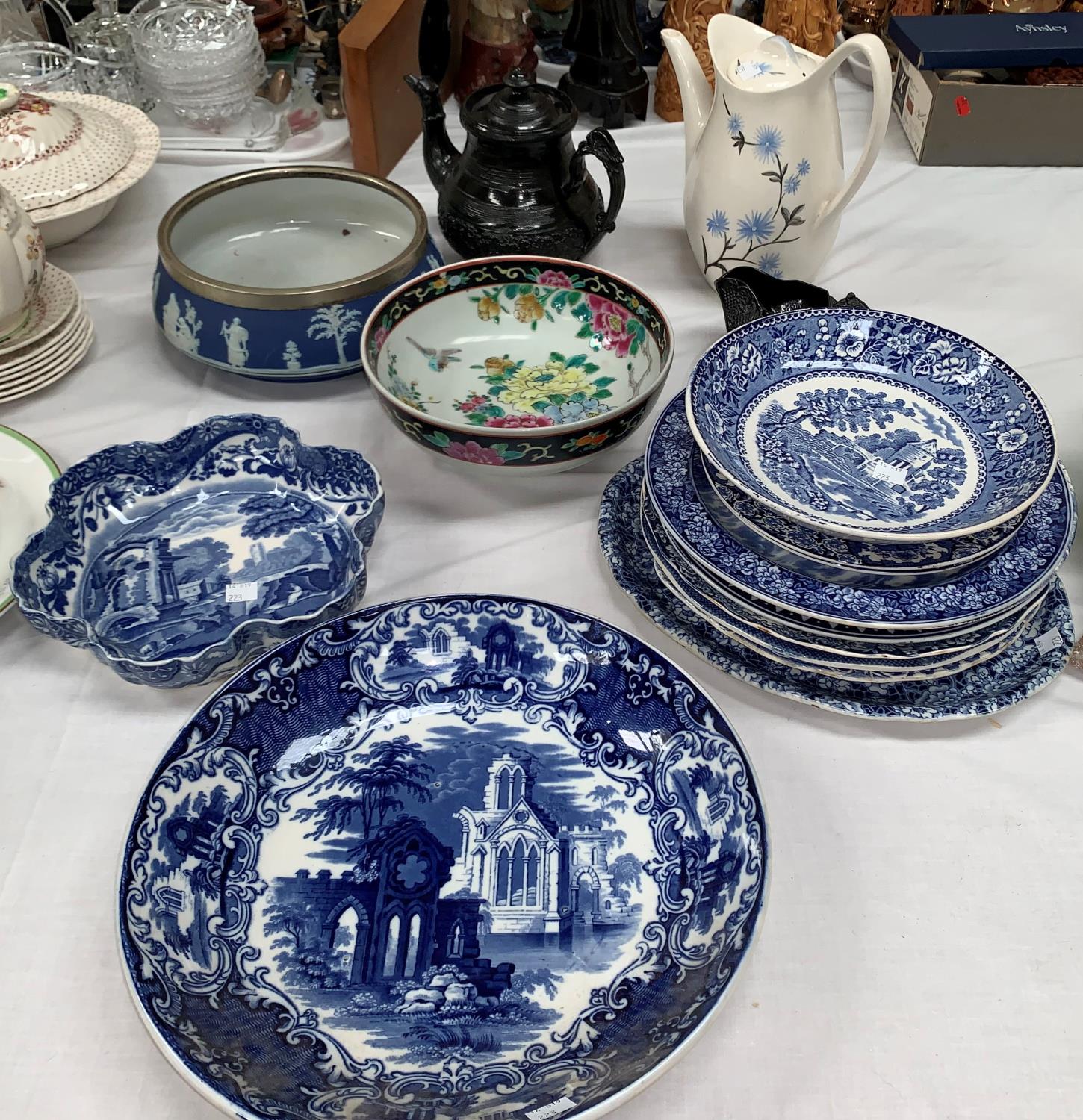 A Wedgwood blue jasperware bowl; a 19th century black stoneware teapot and jug; an Abbey blue