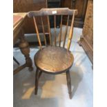 A set of 4 elm stick back kitchen chairs