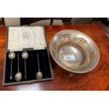 A silver bon-bon dish, pierced and beaded; a set of 6 bean knop spoons, cased