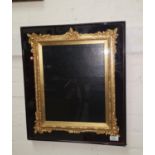 A Victorian glazed cabinet frame with ornate gilt mount, inset size 35 cm x 28 cm