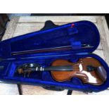 A STENTOR half size violin with two piece back 31cm with natural wood bow, plush fitted case.