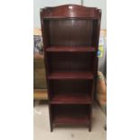 A mahogany 5 height narrow bookcase