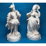 A pair of continental bisque porcelain figures of a courtly lady and gentleman, 35 cm (some damage)