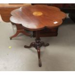 An inlaid pedestal occasional table with circular scalloped top