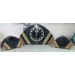 An Art Deco grey marble 3 piece clock garniture, the arched top case and side pieces in-set with