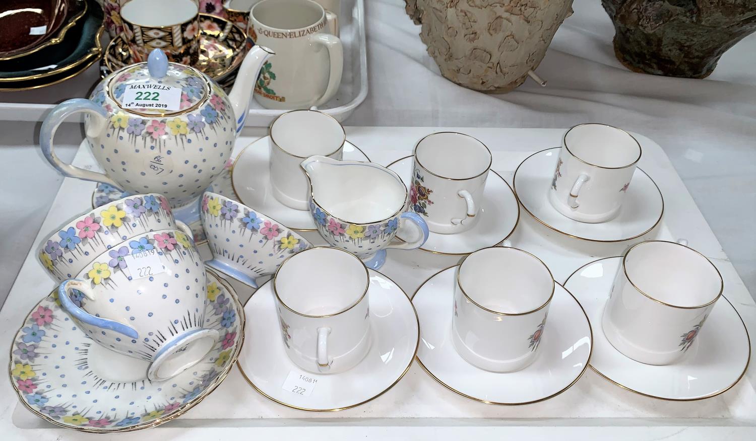 A Foley Art Deco 'Tea for Two' 7 piece tea set; a Royal Worcester set o 6 floral bouquet coffee cans