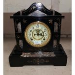 A 19th century mantel clock in black marble case, with inset panels and gilt highlights, cream and