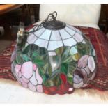A large Tiffany style leaded glass ceiling light shade