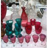 A pair of Victorian green glass goblets; a cranberry glass claret jug; other glasses; 2 cut glass