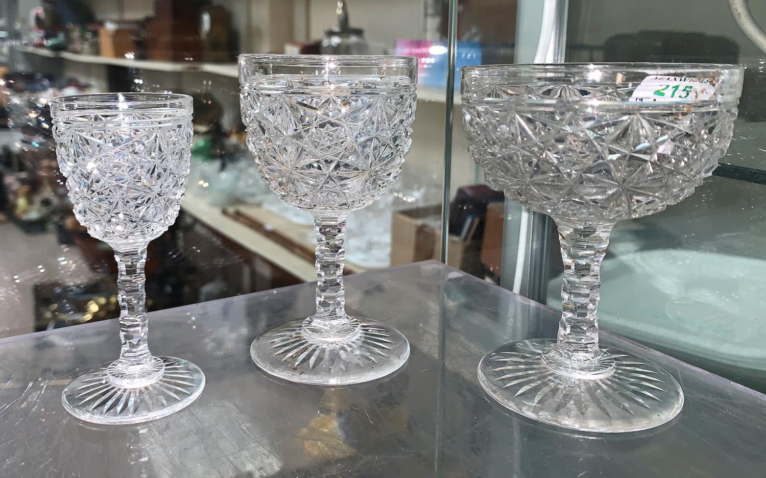 A suite of 3 sizes of cut drinking glasses; a silver plated entrée dish; etc.