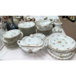 A continental Limoges style large dinner service: soup tureen and bowls; meat plates; dinner and