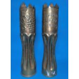 A pair of WW1 Trench Art vases formed from brass shell cases, with crenelated rim, embossed band and