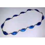 A Norwegian silver necklace, the links in the form of petals in blue enamel, stamped 'D A'