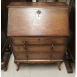 An oak 3 height bureau with fall front