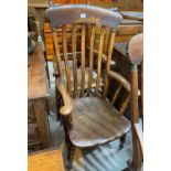 A 19th century elm lath back armchair; a similar ladder back armchair