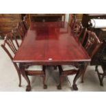 A mahogany Chippendale style dining suite on cabriole legs and ball and claw feet, comprising