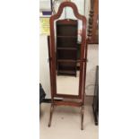 A mahogany period style cheval mirror