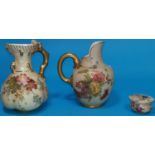 A Royal Worcester peach ground jug with quatrefoil base, gilt claw handle 1507 with floral