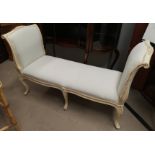 A Louis XV style window seat in cream finish, on cabriole legs