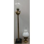 A brass hexagonal standard oil lamp on marble base with brass reservoir, glass shade and chimney;