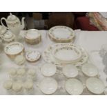 A large Wedgwood Mirabelle part dinner and tea service with floral decoration and gilt borders
