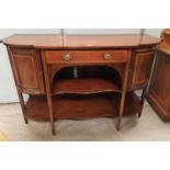 An Edwardian inlaid mahogany 'D' front sideboard of 2 cupboards, drawer and open shelves