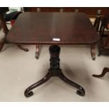 A 19th century mahogany occasional table with rectangular tilt top, on scroll feet; a 1930's oak