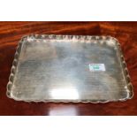 A silver rectangular dressing table tray, engine turned with folded border, Birmingham 1923, 11.8 oz