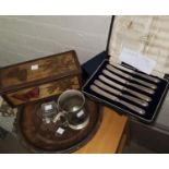 A set of 6 silver handle tea knives, cased; a pair of crystal goblets, cased; a silver plated mug; a
