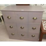 A modern chest of 3 drawers in grey finish; A lattice work hardwood linen basket