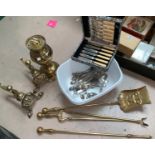 A Victorian style set of 3 brass fire irons and dogs; a brass oil lamp; a fish canteen, cased;