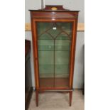 An Edwardian mahogany narrow display cabinet with satinwood crossbanding, in the Sheraton style,