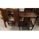 A 1930's oak drop leaf dining table with 'D' end; an oak 2 tier barley twist tea trolley; a wall