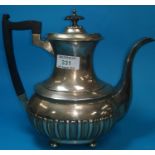 A hallmarked silver coffee pot in the Georgina style with fluted lower body, Sheffield 1920