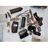 A selection of collectables including gold rim spectacles; corkscrews; etc.